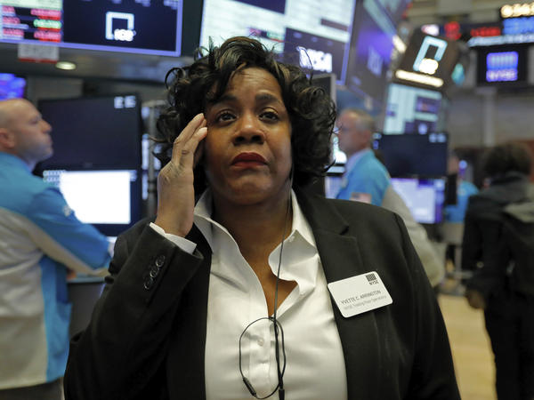 Yvette Arrington with the New York Stock Exchange trading floor operations watches the market slide on March 9 as coronavirus fears grip the financial markets.