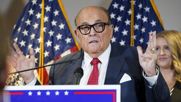 The New York State Bar Association is launching a "historic" inquiry into Trump attorney Rudy Giuliani, shown here at a November press conference in Washington, D.C.