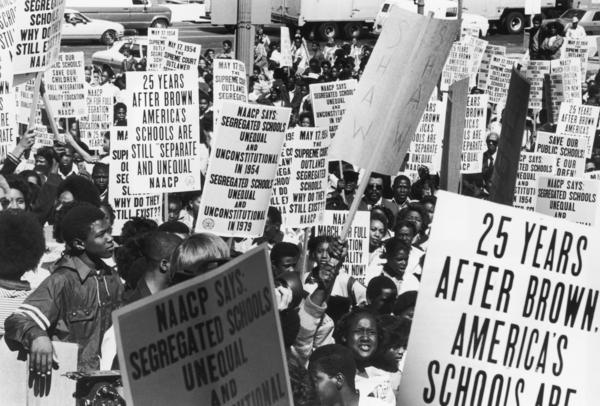 Students and members of the NAACP march in Washington in May 1979, the 25th anniversary of the U.S. Supreme Court ruling that racial segregation in U.S. schools was unconstitutional.