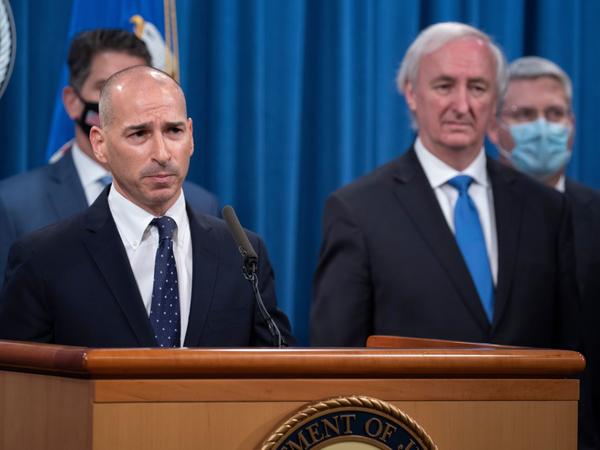 The acting U.S. attorney for the District of Columbia, Michael Sherwin (left), is overseeing the massive criminal investigation of Wednesday's assault on the U.S. Capitol.
