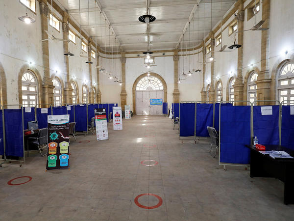 The Khaliq Dina Hall and Library building in Karachi, Pakistan, has been converted into a COVID-19 vaccination center.