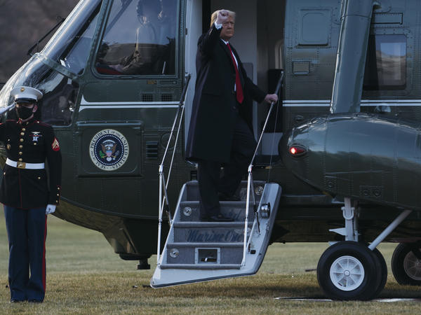 Former President Donald Trump boards Marine One as he departs the White House on Jan. 20.