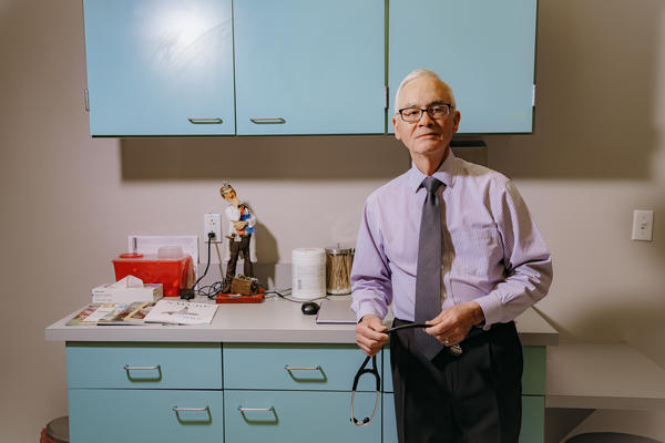 Dr. John Dunlap runs a direct primary care practice in Overland Park, Kan., offering patients direct access to him by phone and longer appointment times. The model is similar to concierge medicine.