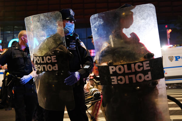 Police confront protesters in front of the Barclays Center in Brooklyn, NY, on May 29, 2020.