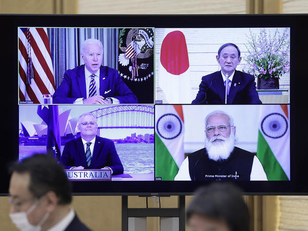 President Biden (clockwise from top left), Japanese Prime Minister Yoshihide Suga, Indian Prime Minister Narendra Modi and Australian Prime Minister Scott Morrison participate in the virtual Quadrilateral Security Dialogue or Quad meeting on Friday.
