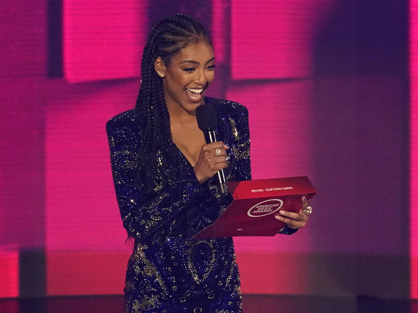 Tayshia Adams appears at the American Music Awards in Los Angeles on Nov. 22, 2020. She will co-host <em>The Bachelorette</em> with Kaitlyn Bristowe, Warner Horizon and ABC Entertainment announced.