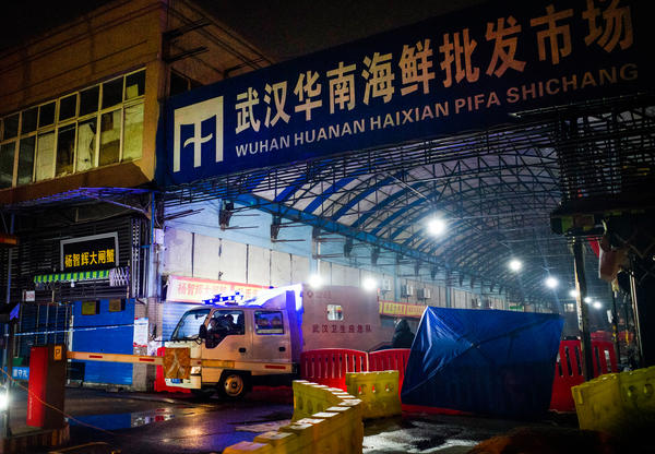 When COVID-19 first broke out in Wuhan, scientists tracked a large number of the cases to the Huanan Seafood Market in Wuhan. Above: The Wuhan Hygiene Emergency Response Team departs the market on Jan. 11, 2020, after it had been shut down to prevent the spread of the coronavirus.