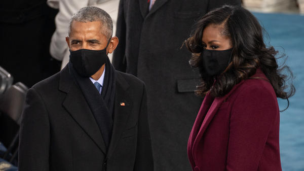 Former President Barack Obama and former first lady Michelle Obama arrive at President Biden's inauguration.