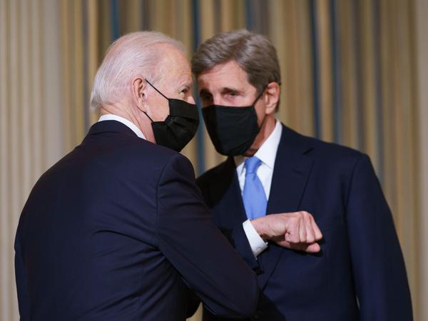President Biden greets Special Presidential Envoy for Climate John Kerry in January.