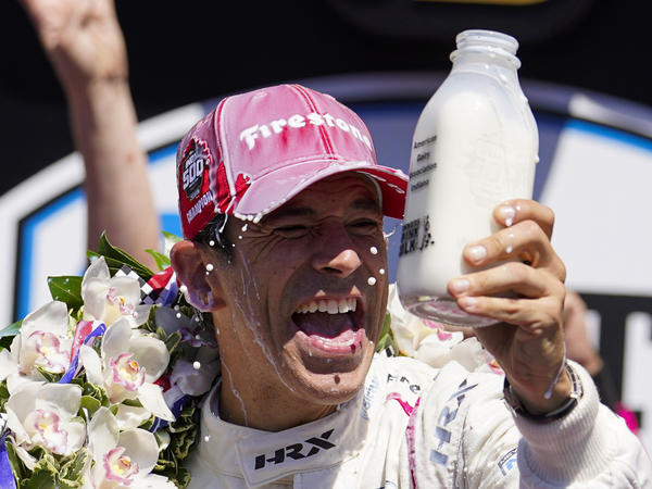Helio Castroneves won his fourth Indianapolis 500 race Sunday, becoming the fourth racer in history to do so.