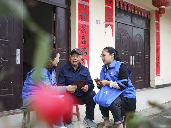 Workers in China collect demographic data in the the seventh population census on Nov. 1, 2020.