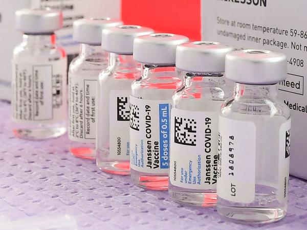 Bottles of the single-dose Johnson & Johnson COVID-19 vaccine await transfer into syringes for administering last month in Los Angeles.
