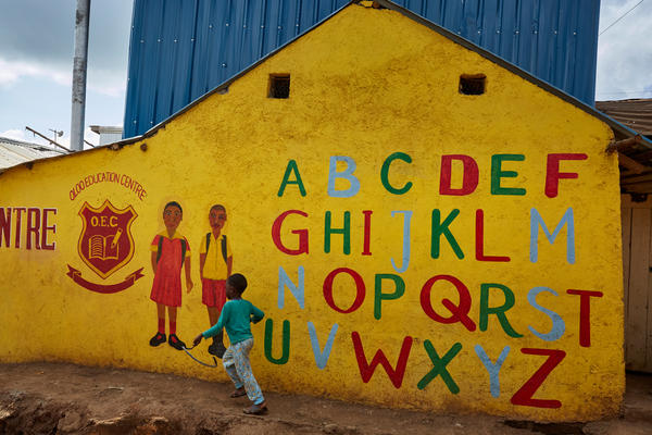 In his new book for young teenagers, Charles Kenny points out signs of global progress, including the growing number of kids in school. Above: The Oloo Education Center aims to provide an education to kids in Kibera, a poor community in Nairobi, Kenya. When you type "Kibera" into the Uber app, it comes up as "Kibera slum."