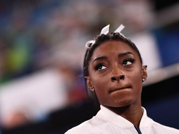 Simone Biles reacts during the artistic gymnastics women's team final Tuesday at the Ariake Gymnastics Centre during the Tokyo Games.