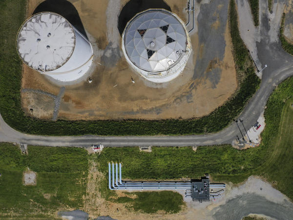Fuel holding tanks are pictured at Colonial Pipeline's Dorsey Junction Station in Woodbine, Maryland in May 2021, the month that a cyberattack disrupted gas supply to the eastern U.S. for several days.