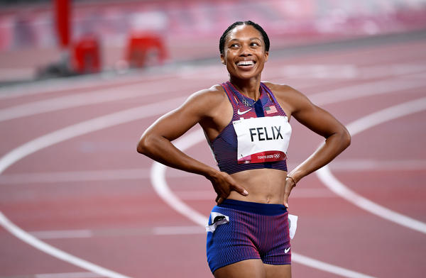 U.S. track star Allyson Felix smiles after winning the bronze medal in the 400 meter race on Friday.