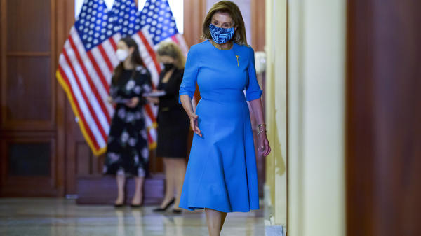 House Speaker Nancy Pelosi, D-Calif., at the U.S. Capitol on Wednesday. The House of Representatives passed a bill to keep the government funded and suspend the debt ceiling, but Republicans are expected to block it in the Senate.