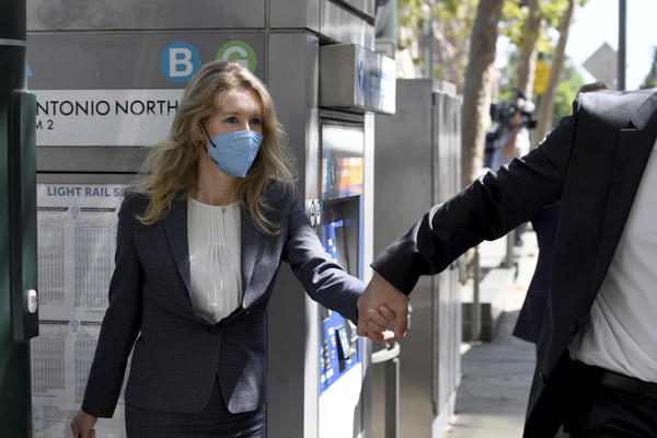 Elizabeth Holmes leaves the federal courthouse in San Jose, Calif., on Sept. 8.
