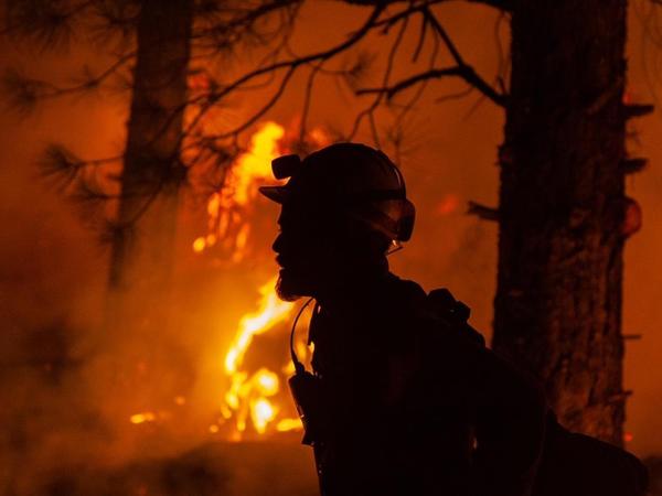 A firefighter during night operations recently on the Bootleg fire in southern Oregon.