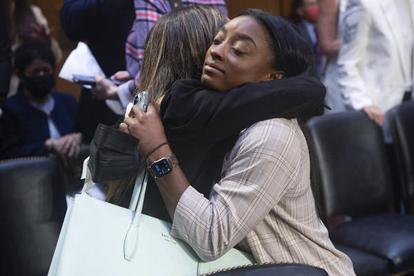 United States gymnasts Kaylee Lorincz and Simone Biles hug after a Senate Judiciary hearing about the Inspector General's report on the FBI's handling of the Larry Nassar investigation on Sept. 15, 2021.