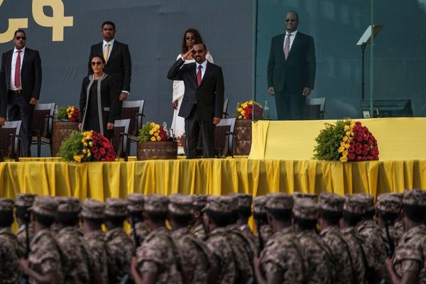 Ethiopian Prime Minister Abiy Ahmed salutes members of the national defense forces during the inauguration ceremony of the new government in early October.