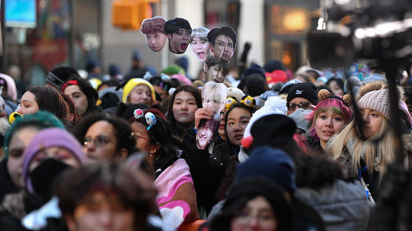 Fans await the K-pop boy band BTS visit to the <em>Today</em> show at Rockefeller Plaza in New York City last year.