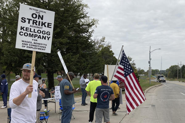 Workers from a Kellogg cereal plant picket along the main rail lines leading into the facility on Oct. 6 in Omaha, Neb. Workers have gone on strike after a breakdown in contract talks with company management.