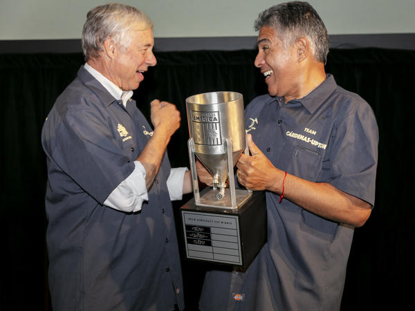Rep. Fred Upton, R-Mich., and Rep. Tony<strong> </strong>Cárdenas, D-Calif., emerge victorious in the fourth Anheuser-Busch Brew Across America Congressional Brewing Competition in Washington, D.C.
