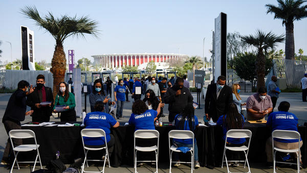 Los Angeles International Airport and SoFi Stadium employers spoke with potential job applicants at a job fair in Inglewood, Calif., in September. About 19% of all households in an NPR poll say they lost all their savings during the COVID-19 outbreak, and have none to fall back on.