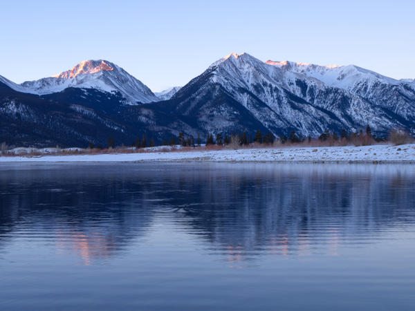 Mount Elbert, the tallest peak in the Rocky Mountains, is seen here reflected in Twin Lakes near Leadville, Colo. A hiker on the mountain didn't answer rescuers' phone calls because the number was unfamiliar.