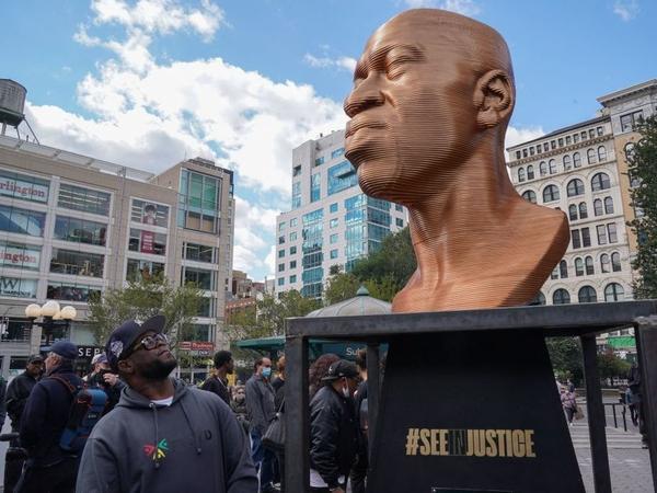 The immersive art organization, Confront Art in collaboration with the NYC Parks, unveils the SEENINJUSTICE exhibit, featuring three sculptures by Chris Carnabucci: George Floyd, Breonna Taylor and John Lewis, at Union Square Park in New York, on Sept. 30. Authorities arrested a suspect in connection with vandalism of the statue several days later.