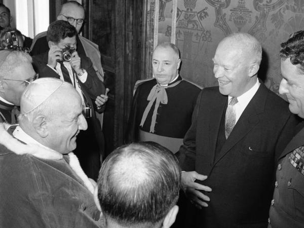 Pope John XXIII with President Dwight D. Eisenhower, who stands at left, during an audience granted in the pontiff's private library in the Vatican Palace on Dec. 6, 1959. Eisenhower was the second U.S. president to meet the pope.