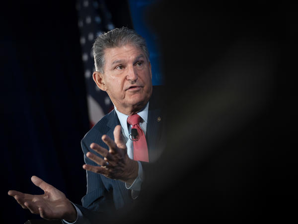 Sen. Joe Manchin, seen here on Oct. 26, told reporters on Monday that he's not yet ready to back President Biden's $1.75 trillion social spending package.