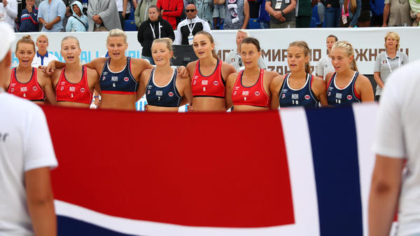 Norway's team lines up during the 2018 Women's Beach Handball World Cup final against Greece in 2018 in Kazan, Russia.