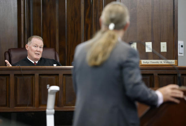 Judge Timothy Walmsley speaks to defense attorney Franklin Hogue during the jury selection process in the trial of the men charged with killing Ahmaud Arbery, at the Glynn County Superior Court in Brunswick, Ga., on Oct. 27.