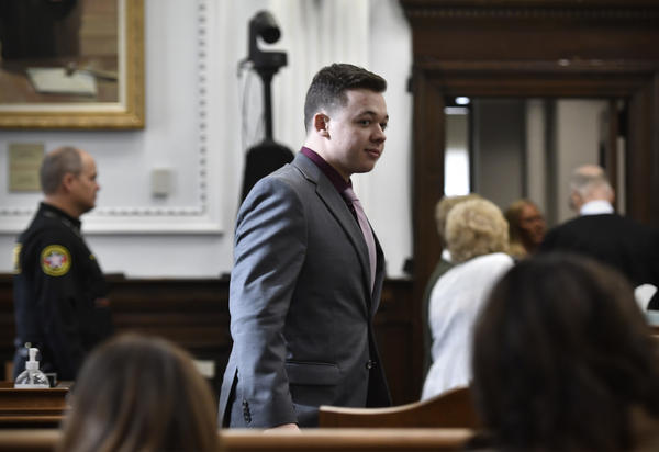Kyle Rittenhouse returns to the courtroom after a break during his trial at the Kenosha County Courthouse on November 9, 2021 in Kenosha, Wisconsin.