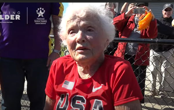 A screenshot shows Julia "Hurricane" Hawkins after she set a new world record for the 100-meter in the women's 105+ age bracket.