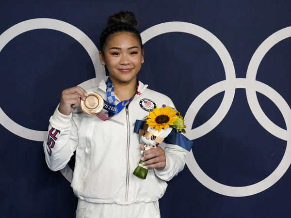 U.S. gymnast Sunisa Lee took home a bronze medal for her performance on the uneven bars at the Tokyo Olympics, as well as a gold medal in the women's all-around.