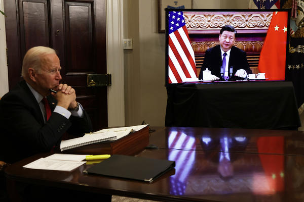 President Biden participates in a virtual meeting with Chinese President Xi Jinping at the Roosevelt Room of the White House Monday.