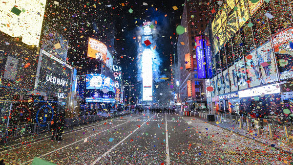Confetti falls at midnight during a virtual New Year's Eve celebration in New York City's Times Square on Jan. 1, 2021. The annual New Year's Eve ball drop event, which typically draws more than 1 million people, was closed to the public due to the COVID-19 risk.