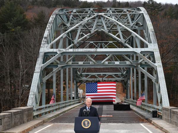 President Biden speaks about his infrastructure bill at a bridge across the Pemigewasset River in Woodstock, N.H., which has been declared structurally unsafe.
