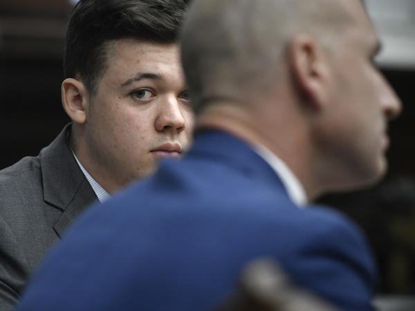 Kyle Rittenhouse listens as Judge Bruce Schroeder talks about how the jury will view video during deliberations in Kyle Rittenhouse's trial at the Kenosha County Courthouse on Wednesday in Kenosha, Wisc.