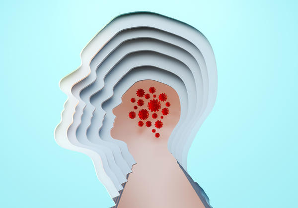 Digital generated image of cut out male head multilayered with covid-19 cells inside on blue background.