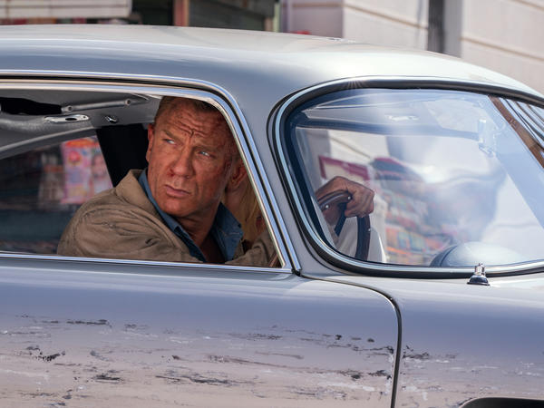 James Bond (Daniel Craig) and Dr. Madeleine Swann (Léa Seydoux) drive through Matera, Italy in No Time To Die. A scientific review of Bond's decades of international adventures concludes that the famous secret agent has consistently neglected critical travel health precautions.