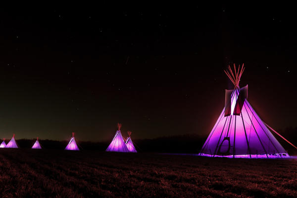 The Oneida Indian Nation unveiled a cultural art installation called "Passage of Peace," which features nine illuminated tipis seen off the New York State Thruway to raise awareness of the impact of COVID-19 on Native Americans.