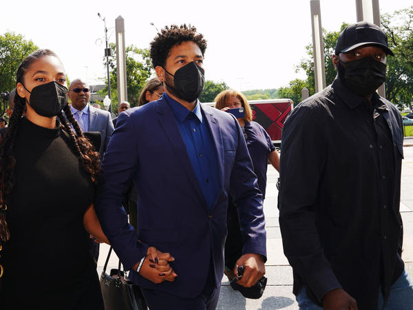 Actor Jussie Smollett, center, arriving at Leighton Criminal Court in Chicago in July. at the  Building on July 14, 2021, in Chicago.
