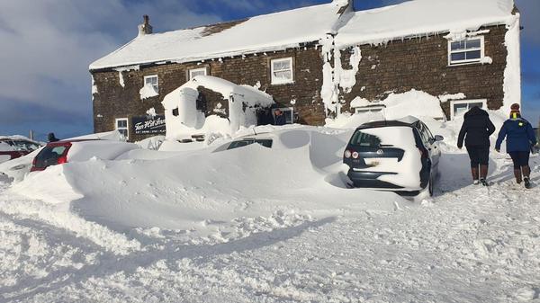 The Tan Hill Inn, in northern England, on Saturday. Dozens of people, mostly strangers, were stranded here for the weekend by snow and dangerous conditions.