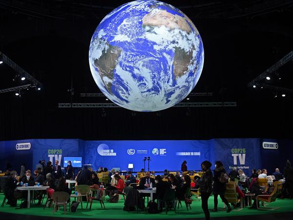 Delegates attend the COP26 UN Climate Change Conference in Glasgow, Scotland