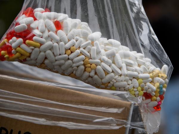 A bag of assorted pills and prescription drugs dropped off for disposal is displayed during the Drug Enforcement Administration's 20th National Prescription Drug Take Back Day earlier this year in Los Angeles. According to the Centers for Disease Control and Prevention, more than  100,000 people died of a drug overdose from April 2020 to April 2021.