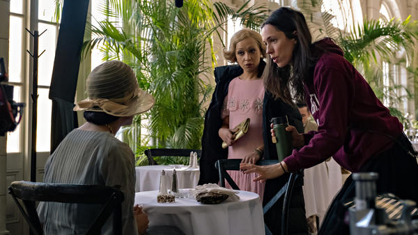 Rebecca Hall (right) works on the set of <em>Passing</em> with actors Ruth Negga (left) and Tessa Thompson.